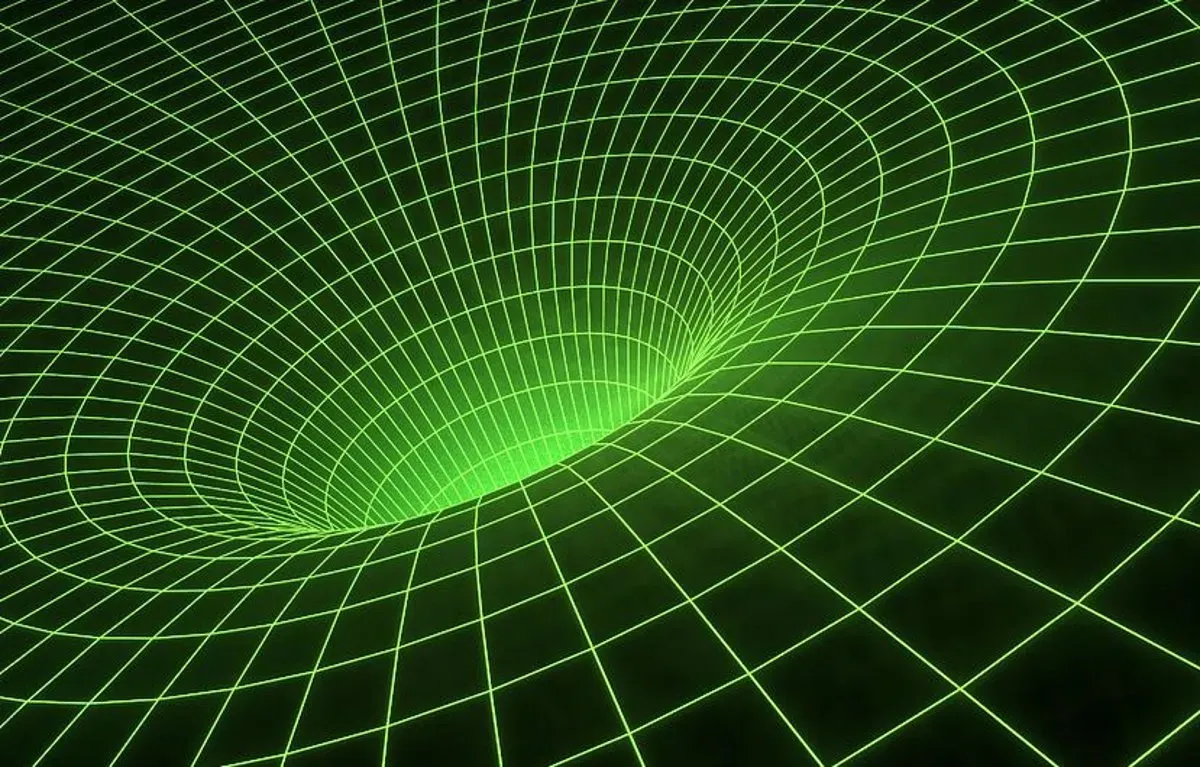 Wormholes: Cosmic Shortcuts That Could Double as Time Machines (Image Credits: Wikimedia)