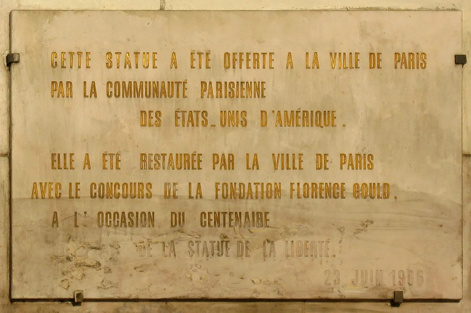 #11 - The Statue of Liberty's "Give Me Your Tired" Plaque (By Gérard Delafond, CC BY 3.0)