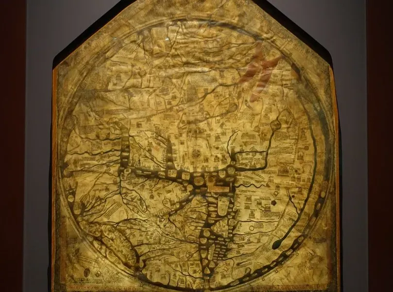 2. Dragons Crawling Over Medieval World Maps (Image Credits: Flickr)