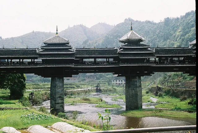 Chengyang Wind and Rain Bridge: Ancient Craft, Modern Appreciation (Image Credits: Wikimedia)