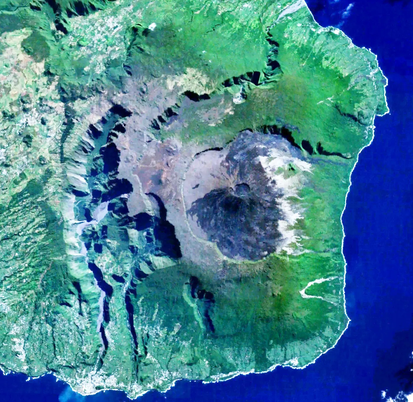 Réunion Island, Home to One of the Most Active Volcanoes on the Planet (Satellite imagery taken from NASA World Wind software (by screenshot), Public domain)