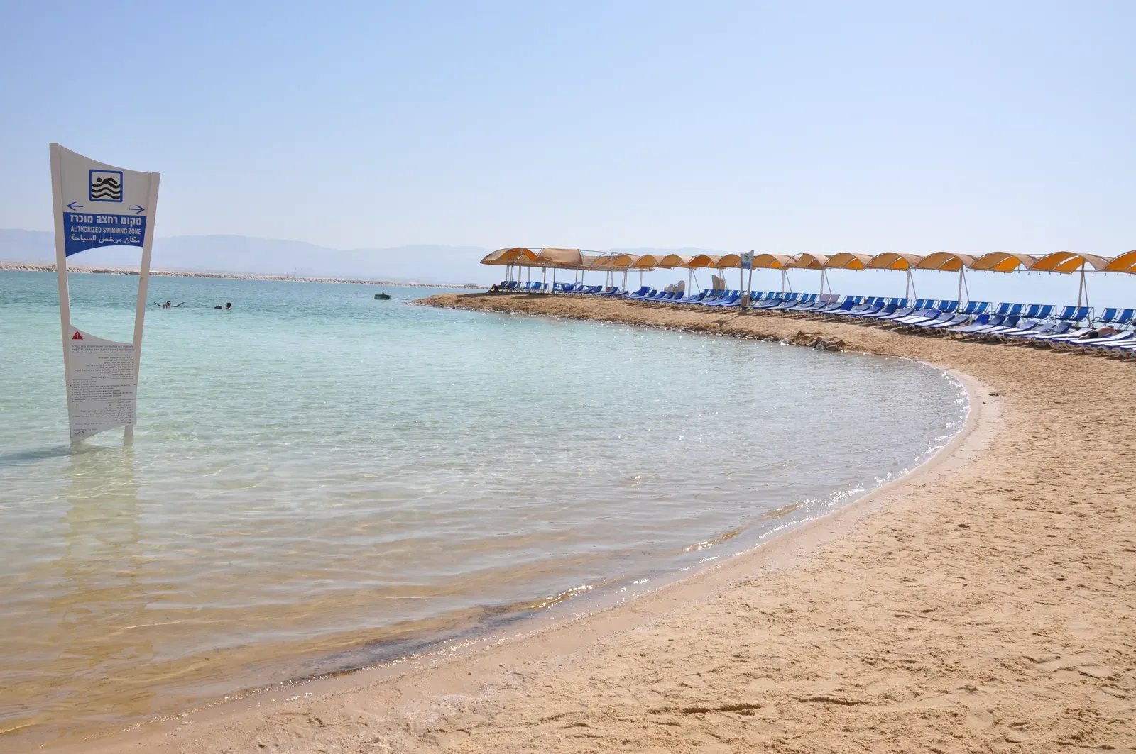 Life Under Stress: How Organisms Faced a Vanishing Sea (Authorised swimming zone on the Dead Sea shore - Earth's lowest elevation on land, CC BY 2.0)