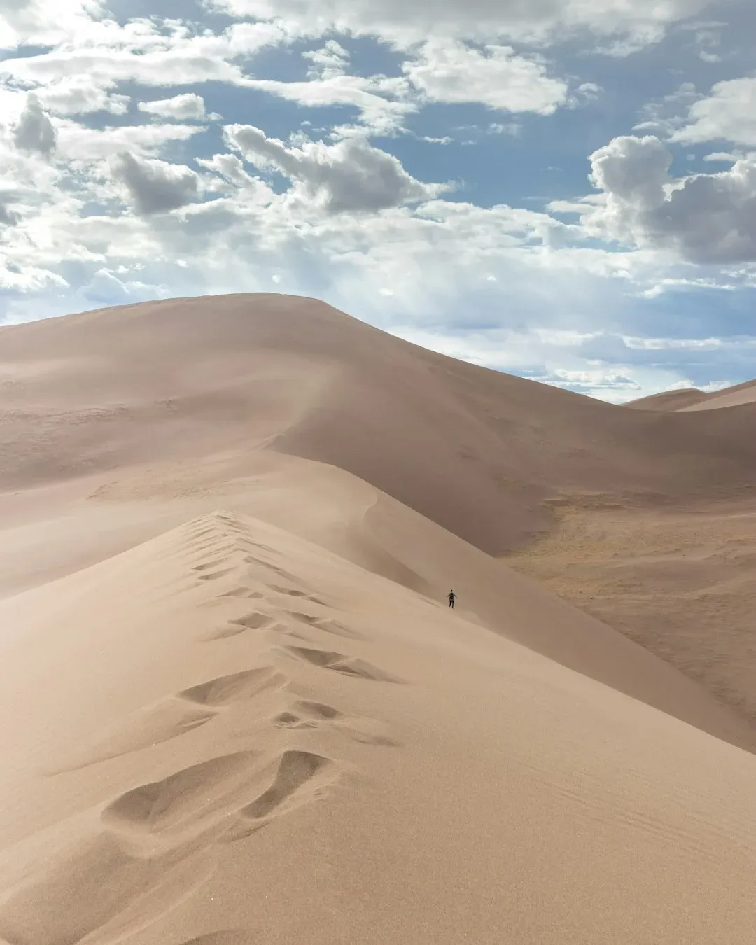 Great Sand Dunes National Park, Colorado: The Tallest Dunes Framed by Ice and Rock (Image Credits: Unsplash)