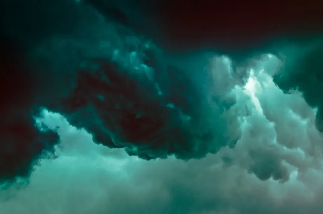 #3 - Green-Tinged Storm Clouds (Image Credits: Unsplash)