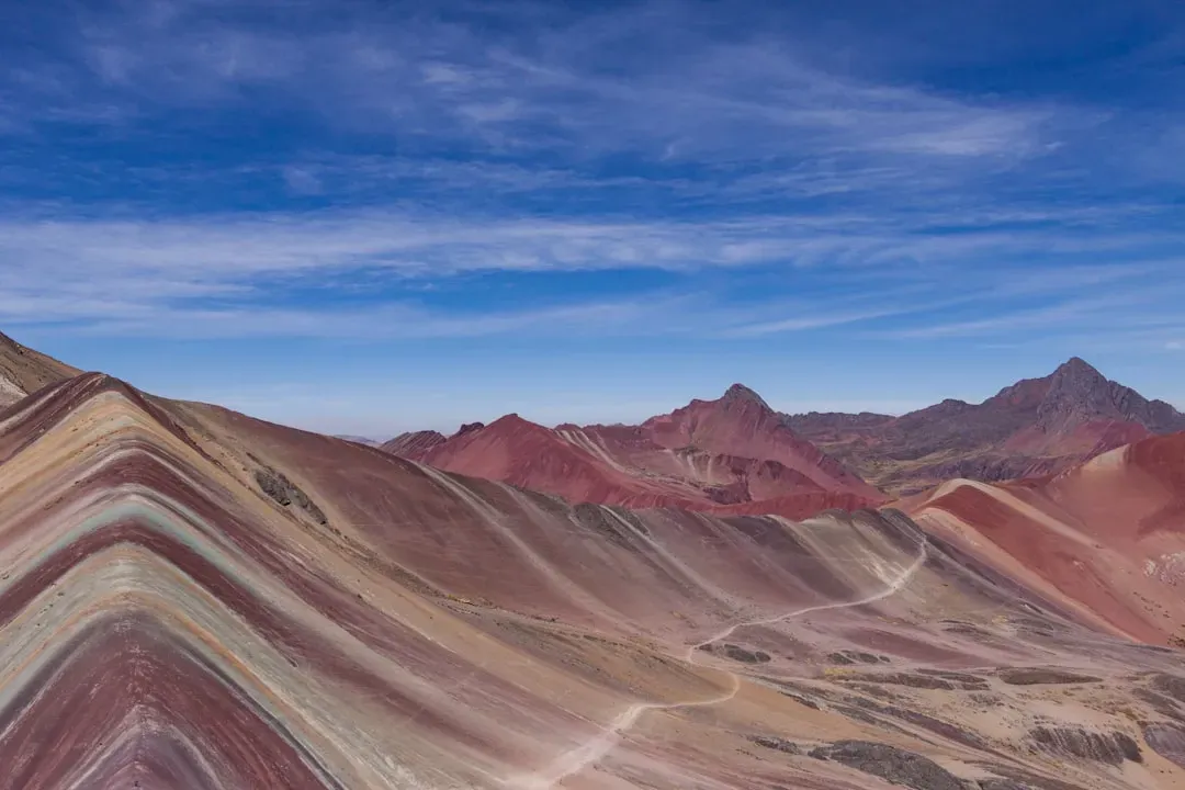10. Rainbow Mountain (Vinicunca), Peru – A Striped Summit in Thin Air (Image Credits: Unsplash)