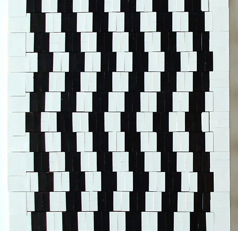 8. The Café Wall Illusion: Straight Lines That Look Crooked (Image Credits: Flickr)