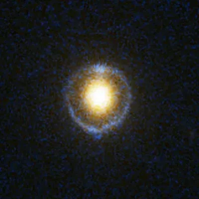 Ultramassive Black Holes Hide in Plain Sight Using Einstein's Physics (Image Credits: Wikimedia)