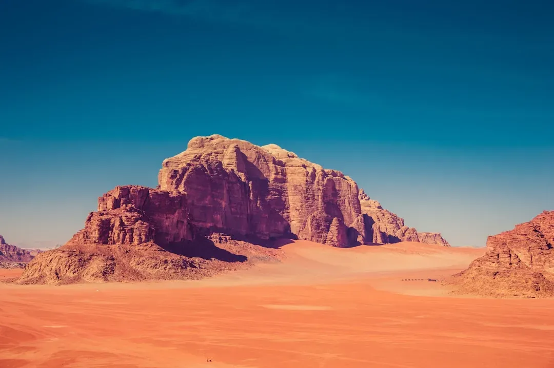 11. Wadi Rum, Jordan – The Valley of Red Sand and Silent Cliffs (Image Credits: Unsplash)