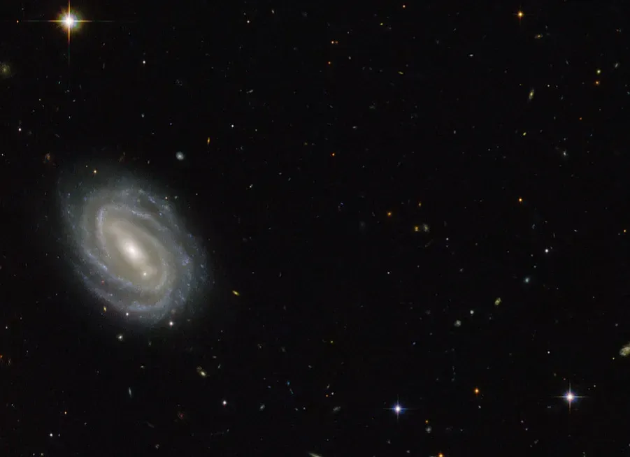 Where the universe started whispering: galaxy rotations and cosmic lenses (Image Credits: Flickr)