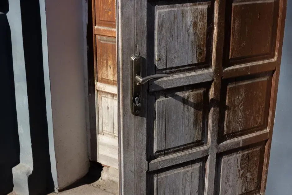 #8 - Doors and Windows That Suddenly Stick or Won't Latch (Image Credits: Pexels)