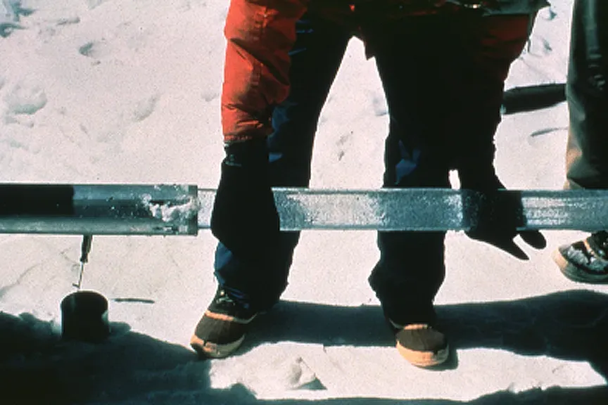 #2 - The Climate Archive in a Single Ice Core Sliver (By Photo by Lonnie Thompson, Byrd Polar Research Center, Ohio State University., Public domain)