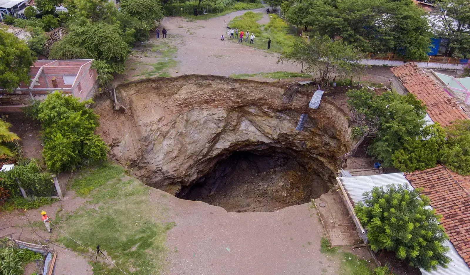 Sinkholes That Swallow Streets Without Warning (Image Credits: Wikimedia)