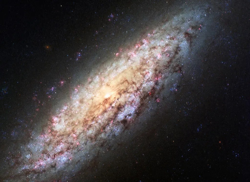 The Sagittarius Dwarf Galaxy: Our Galaxy's Persistent Intruder (Image Credits: Flickr)