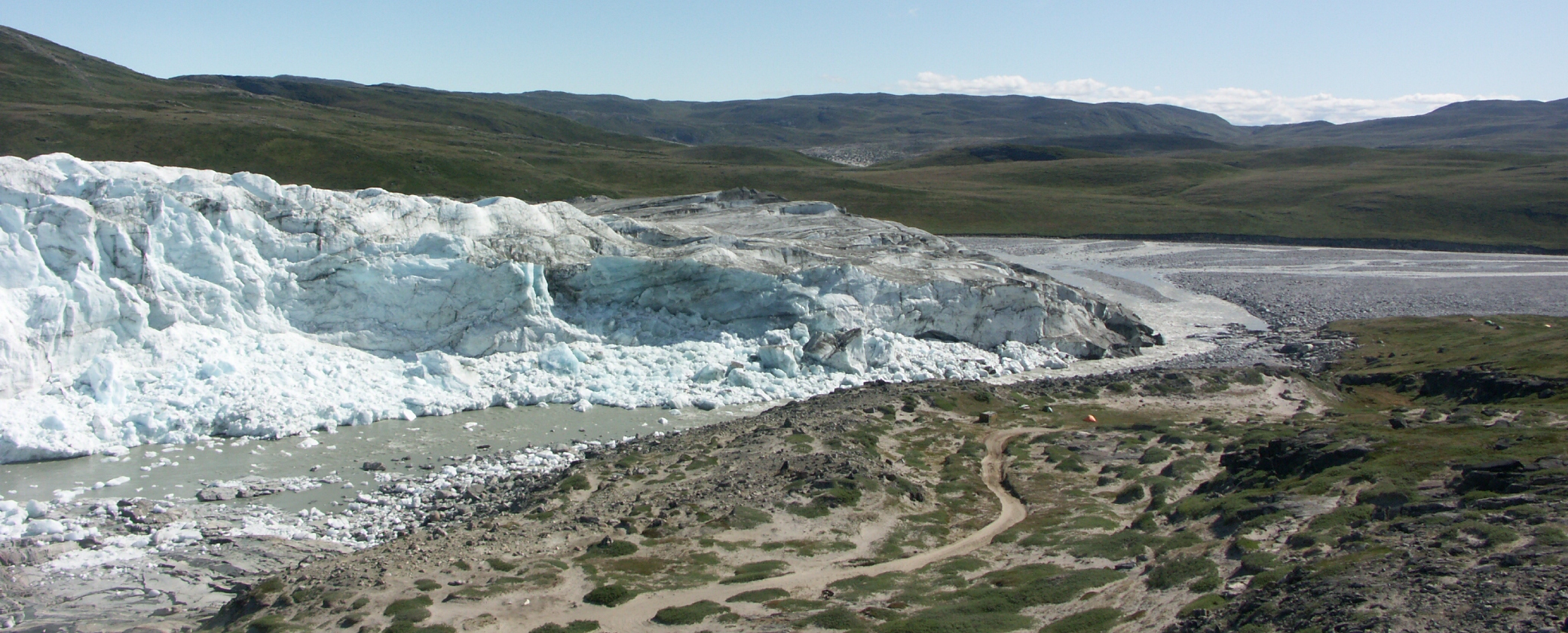The Human Footprint at the Glacier’s Edge (Image Credits: Wikimedia)