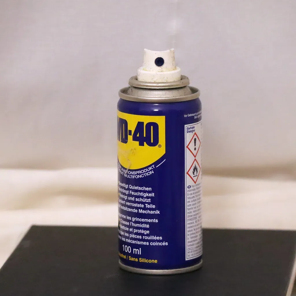 3. WD-40: A Rocket Scientist's Formula That Found Its Way Under Your Kitchen Sink (Image Credits: Flickr)