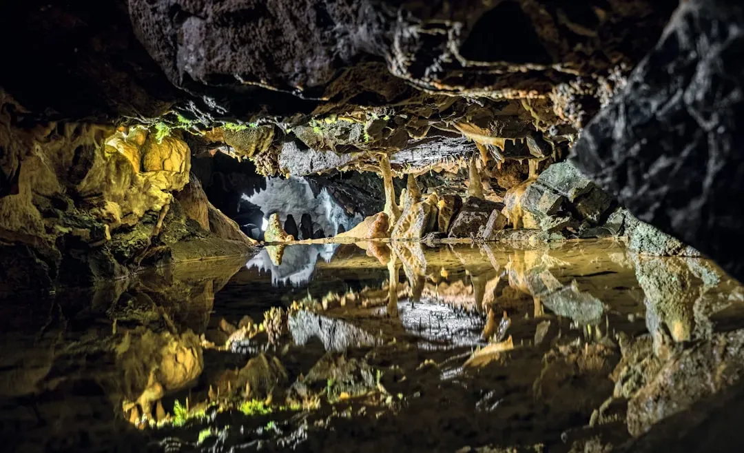 Into the Dark: Caves, Underground Rivers, and Hidden Stone Cathedrals (Image Credits: Unsplash)