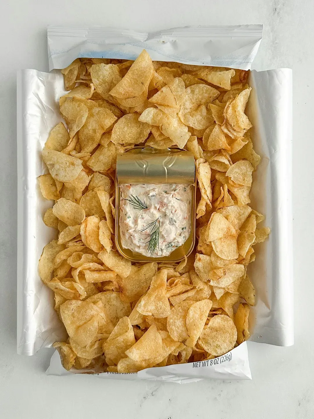 5. The Family-Size Bag of Gas Station Chips (Image Credits: Unsplash)