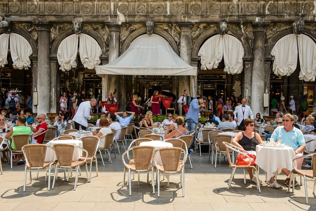 4. Restaurants at St. Mark's Square, Venice - Paying a Fortune for a Pigeon's View (Son of Groucho, Flickr, CC BY 2.0)