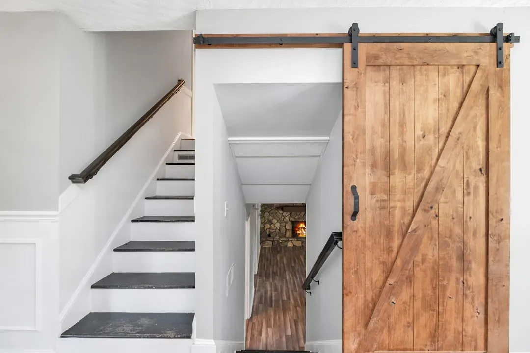 9. Farmhouse-Style Barn Doors and Shiplap (Image Credits: Unsplash)