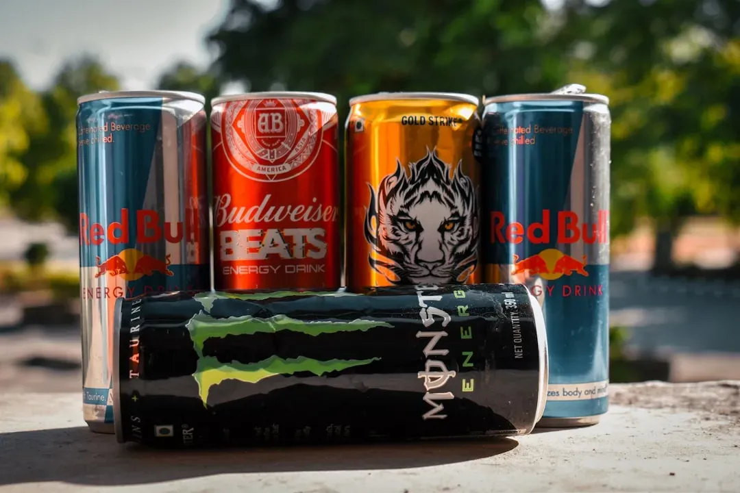 6. Rows of Energy Drinks on the Counter (Image Credits: Unsplash)