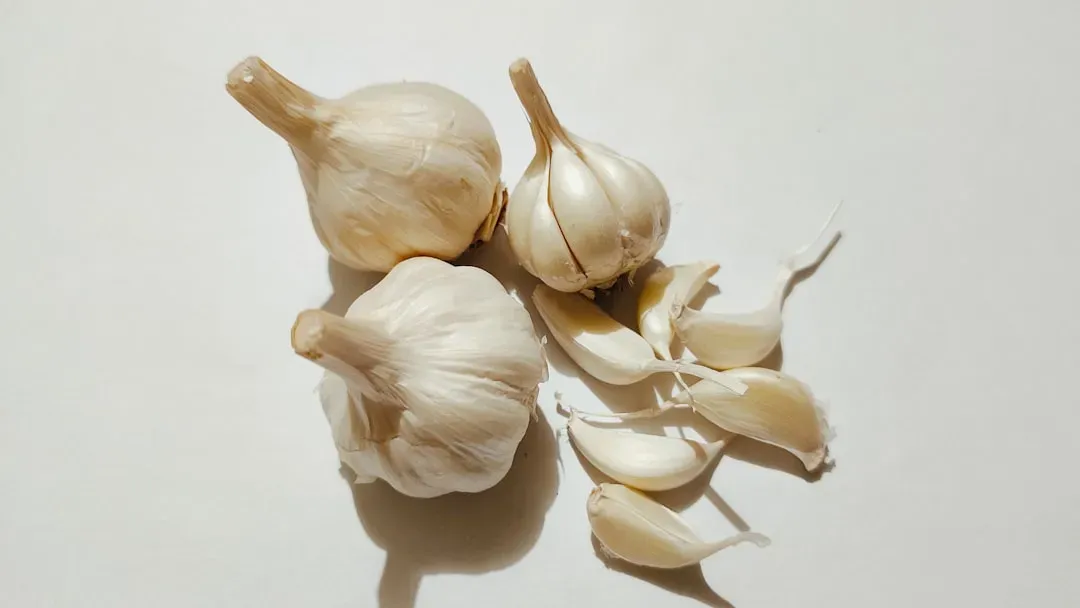Garlic and Onions (Image Credits: Unsplash)