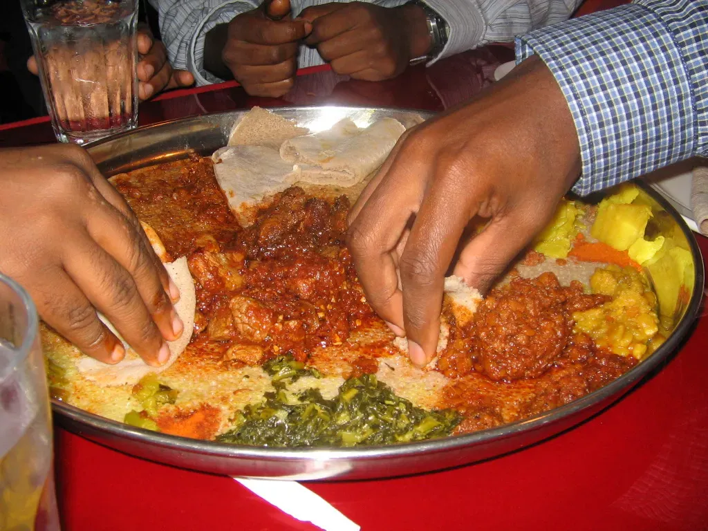 4. Ethiopia's Gursha: Feeding Each Other by Hand (grab it and then eat it, CC BY 2.0)