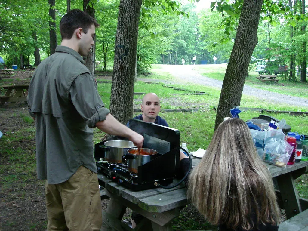 4. You're Comfortable Cooking in Front of Other People (Image Credits: Flickr)