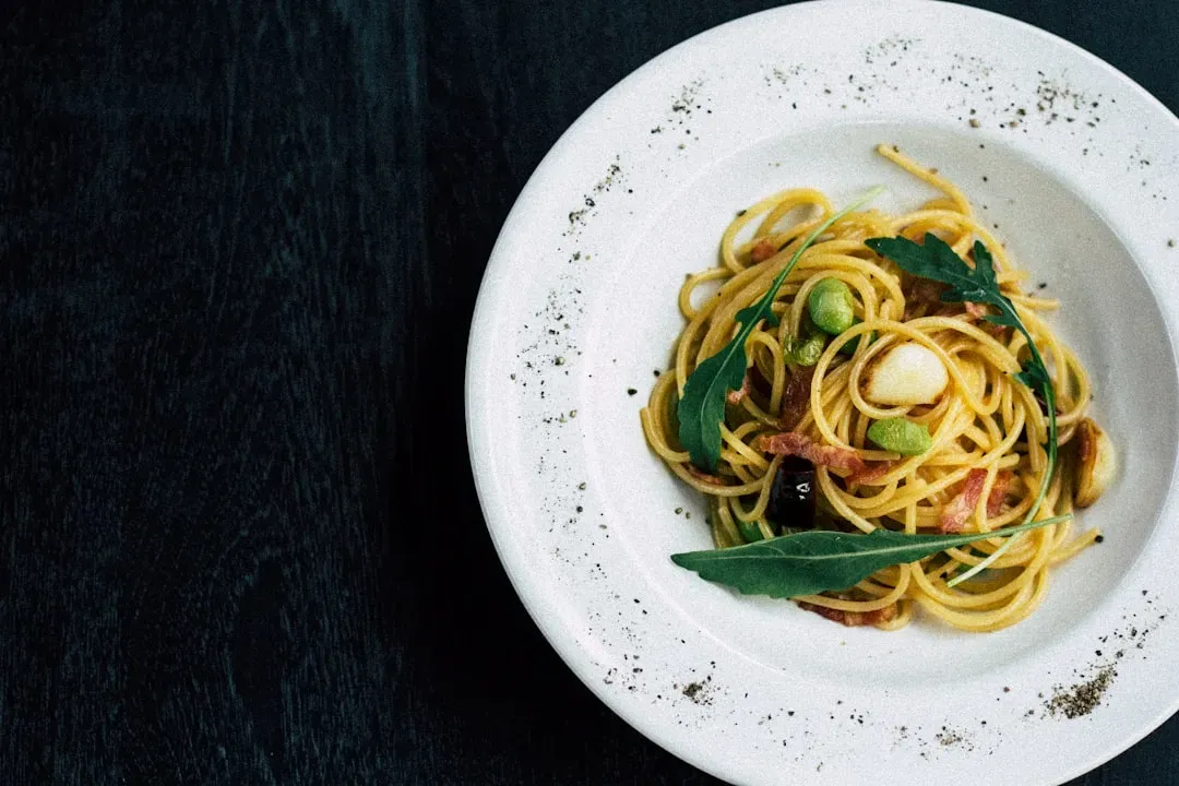 One pot pasta with a simple sauce (Image Credits: Unsplash)