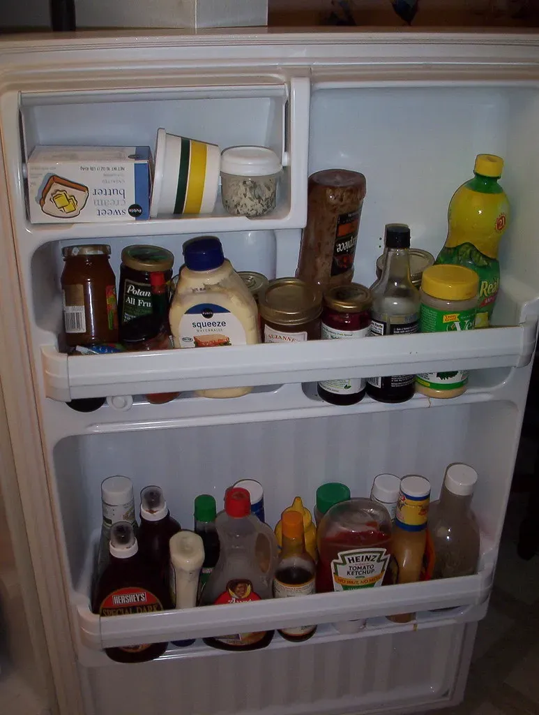 4. Expired Condiments Crowding the Fridge Door (Image Credits: Flickr)
