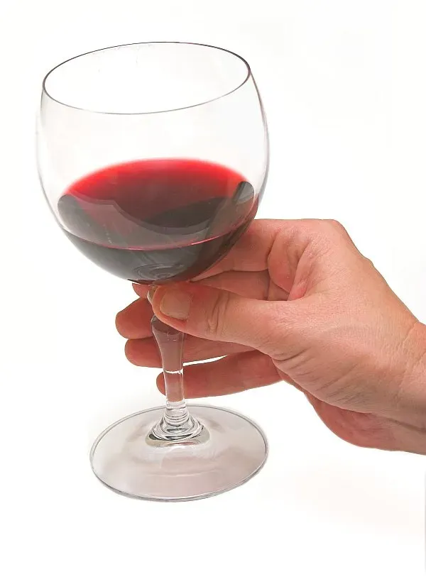 6. You Hold the Wine Glass by the Bowl, Not the Stem (originally posted to Flickr as Glass of wine, CC BY 2.0)