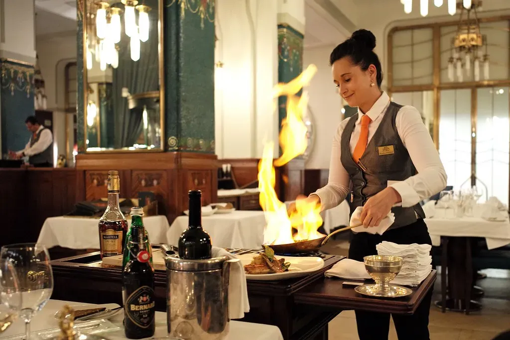 3. Tableside Preparation and Service Trolleys (*rb-photo*, Flickr, CC BY 2.0)