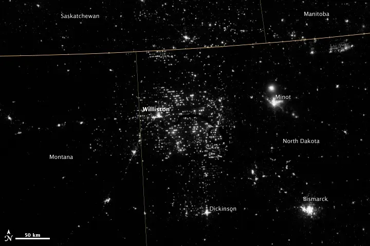 Satellites and Space Traffic (Gas Drilling, North Dakota : Natural Hazards // NASA Earth Observatory,  November 12, 2012. Made by Suomi NPP - VIIRS instrument., Public domain)