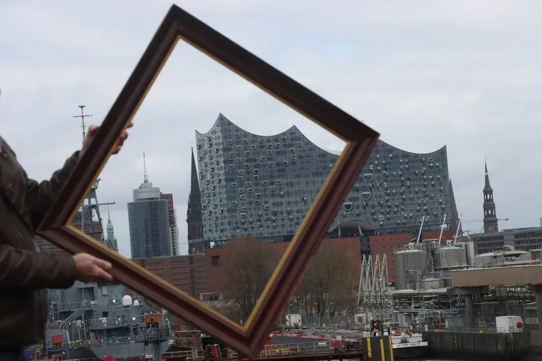 7. Behind Picture Frames (Image Credits: Unsplash)