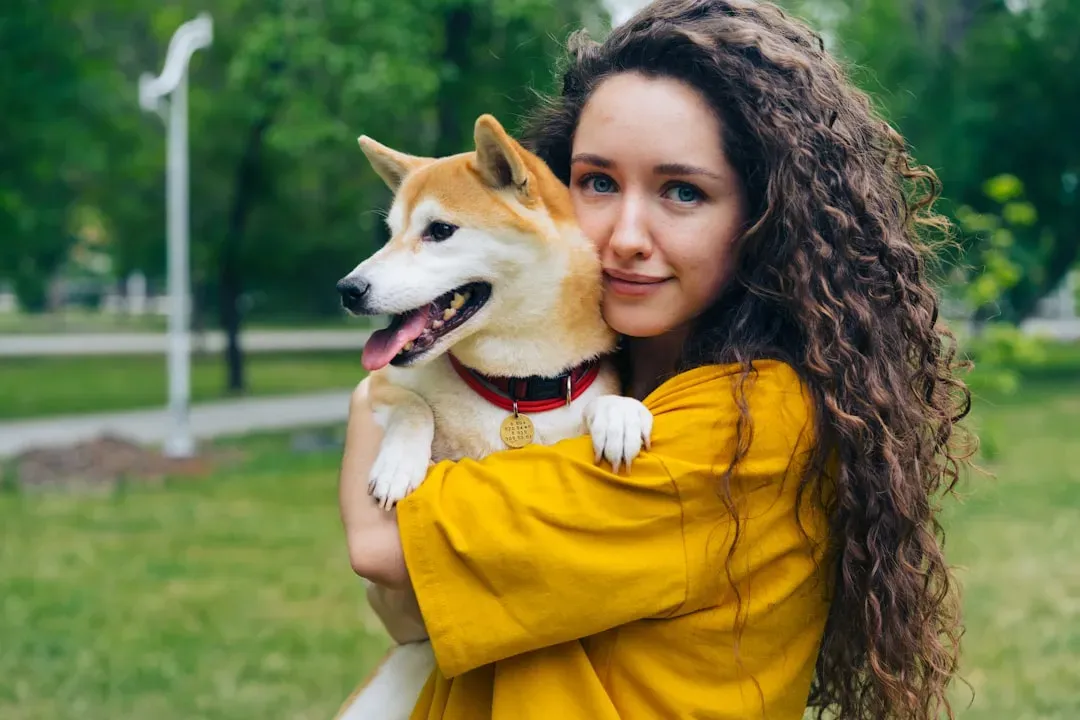 Teenager with Dog (Image Credits: Unsplash)