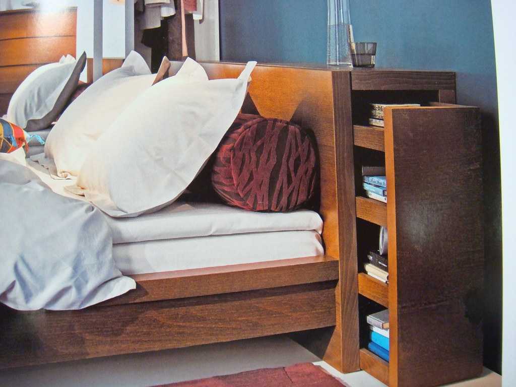 Headboards with Sliding Panels and Hidden Cubbies (image credits: flickr)