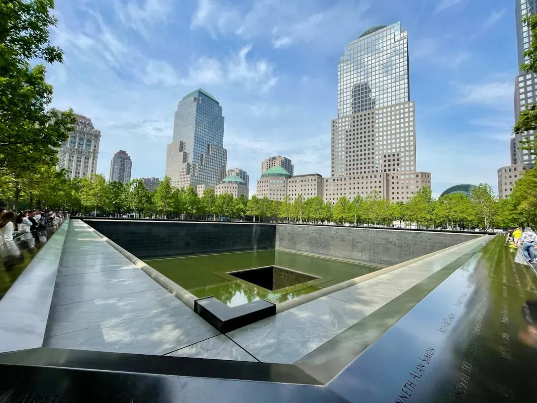 The 9/11 Memorial, New York: Ground Zero, Preserved in Reflection Pools (Image Credits: Unsplash)