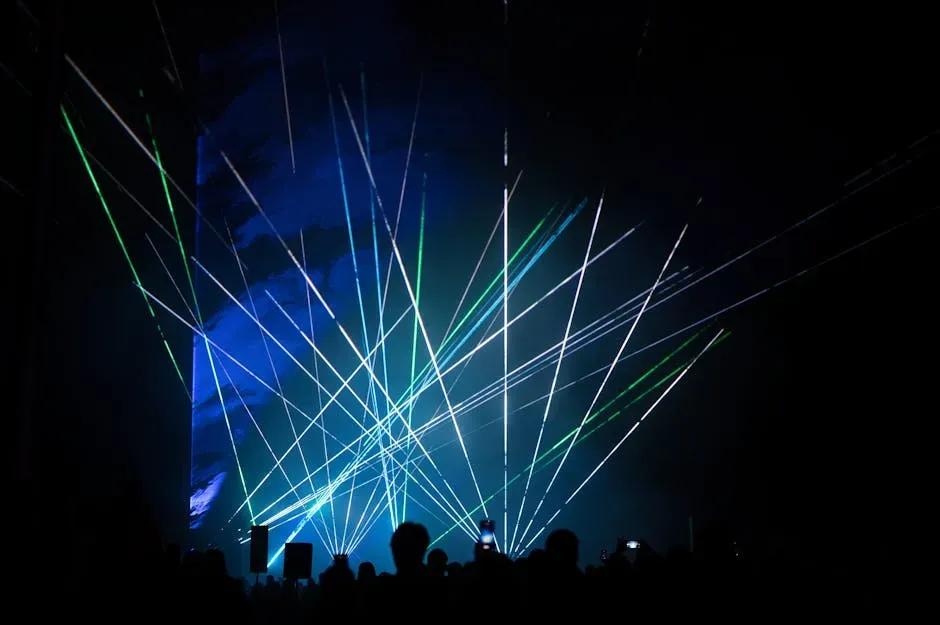 4. Aiming a Laser Pointer at the Stage or Crowd (Image Credits: Pexels)