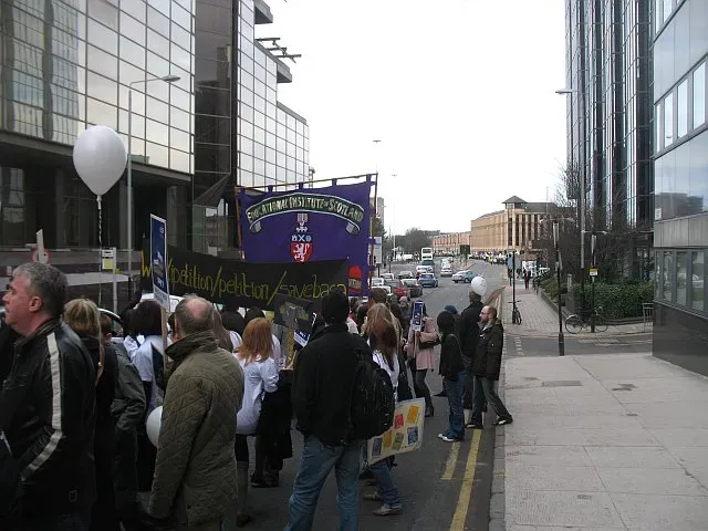 The Staffing Cuts and What They Look Like on the Ground (Image Credits: Wikimedia)