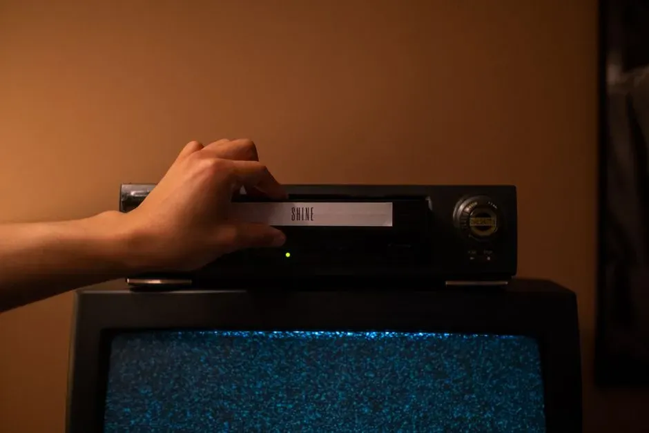 Rewinding a Tape Before Returning It (Image Credits: Pexels)