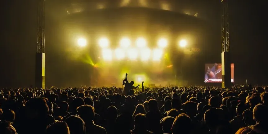 The Two-Way Exchange Between Band and Crowd (Image Credits: Unsplash)