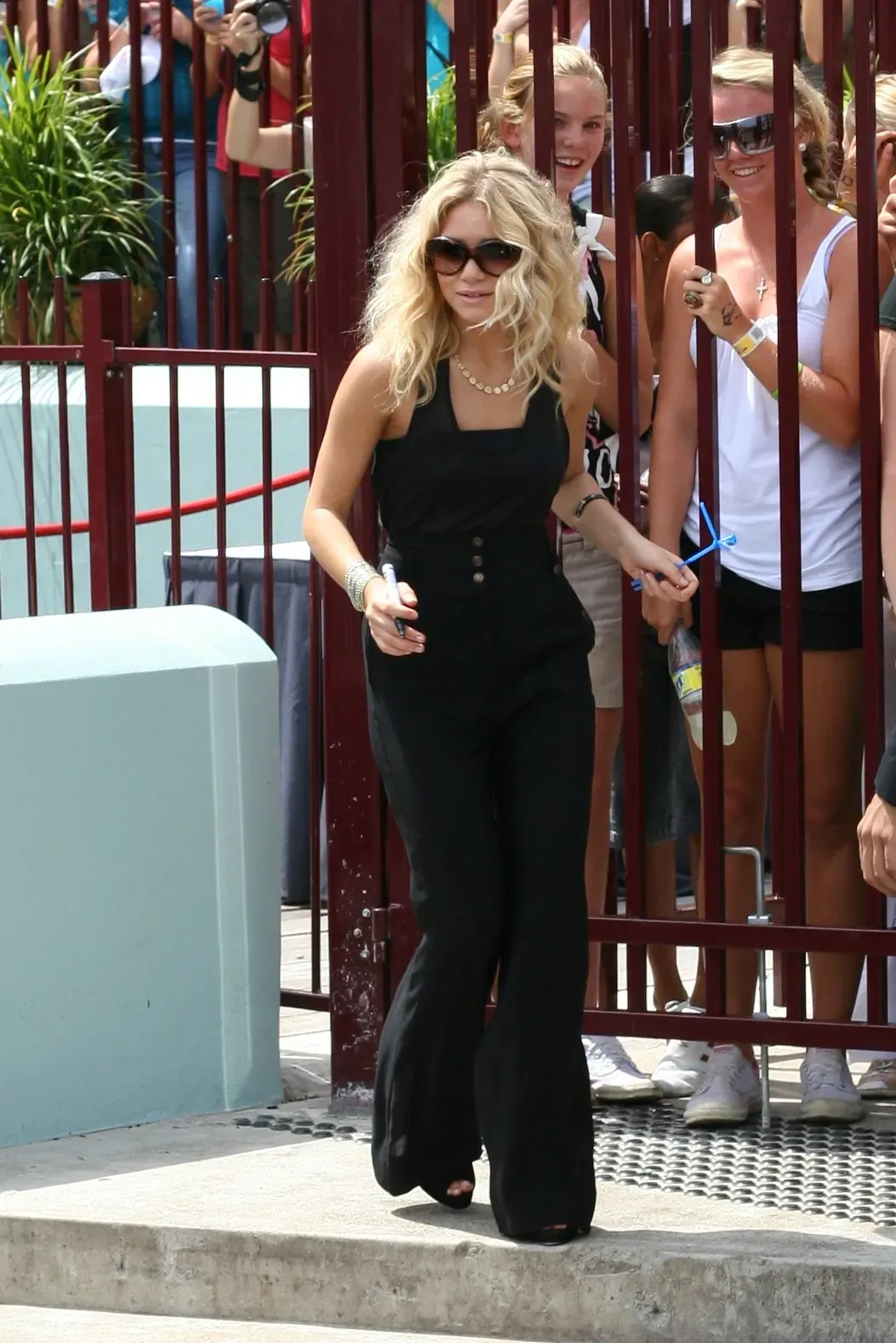 5. Ashley Olsen – A Fashion Empire Over the Silver Screen (Olsen visiting the locals, CC BY 2.0)