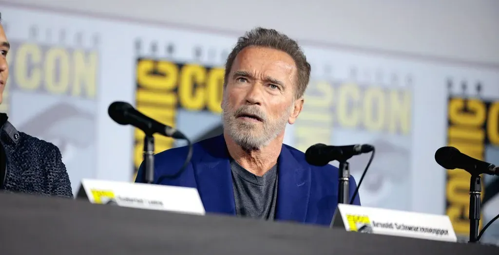 July 30: Arnold Schwarzenegger and Hilary Swank (Image Credits: Flickr)