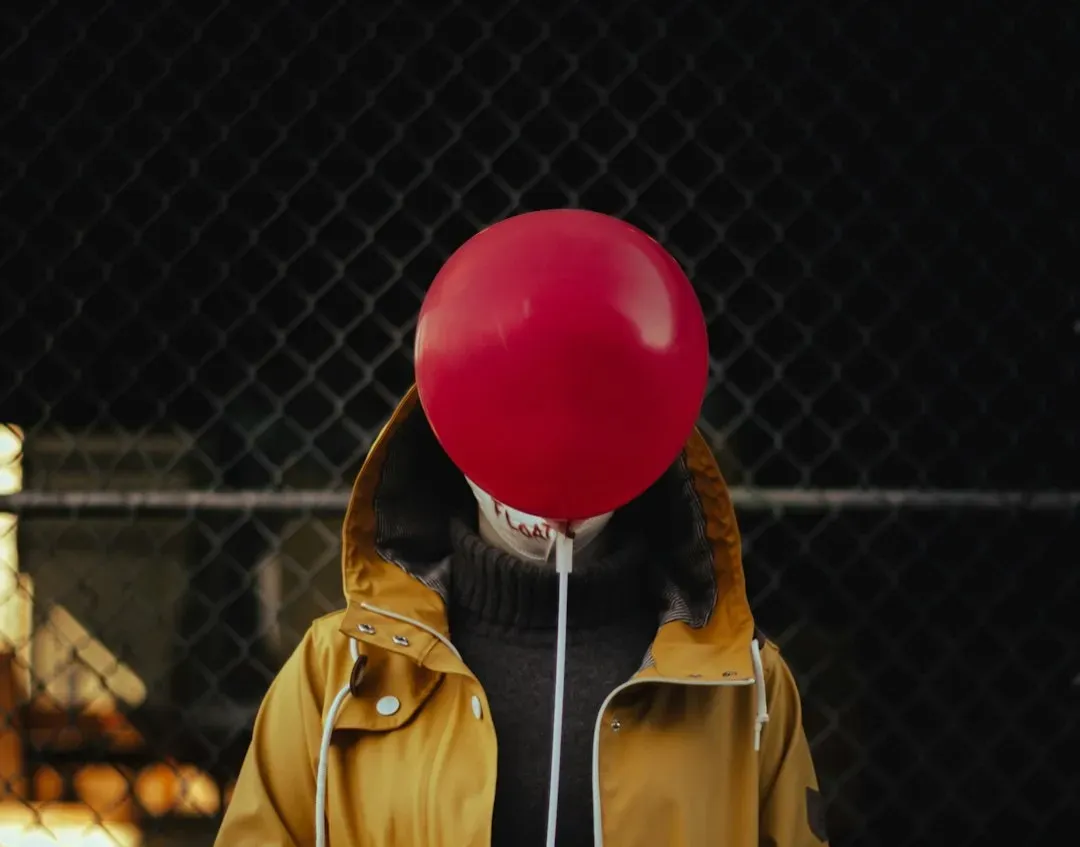 10. A Red Balloon on a String (Image Credits: Unsplash)