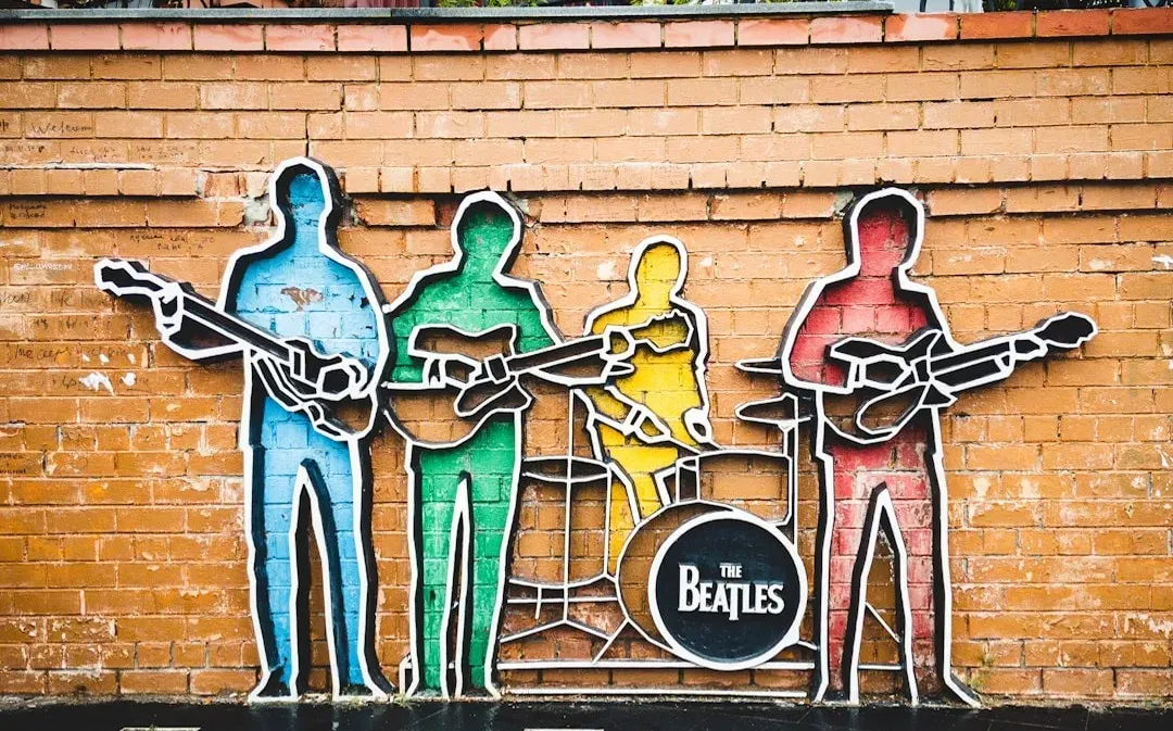 Abbey Road turned four men crossing a street into a funeral (Image Credits: Unsplash)
