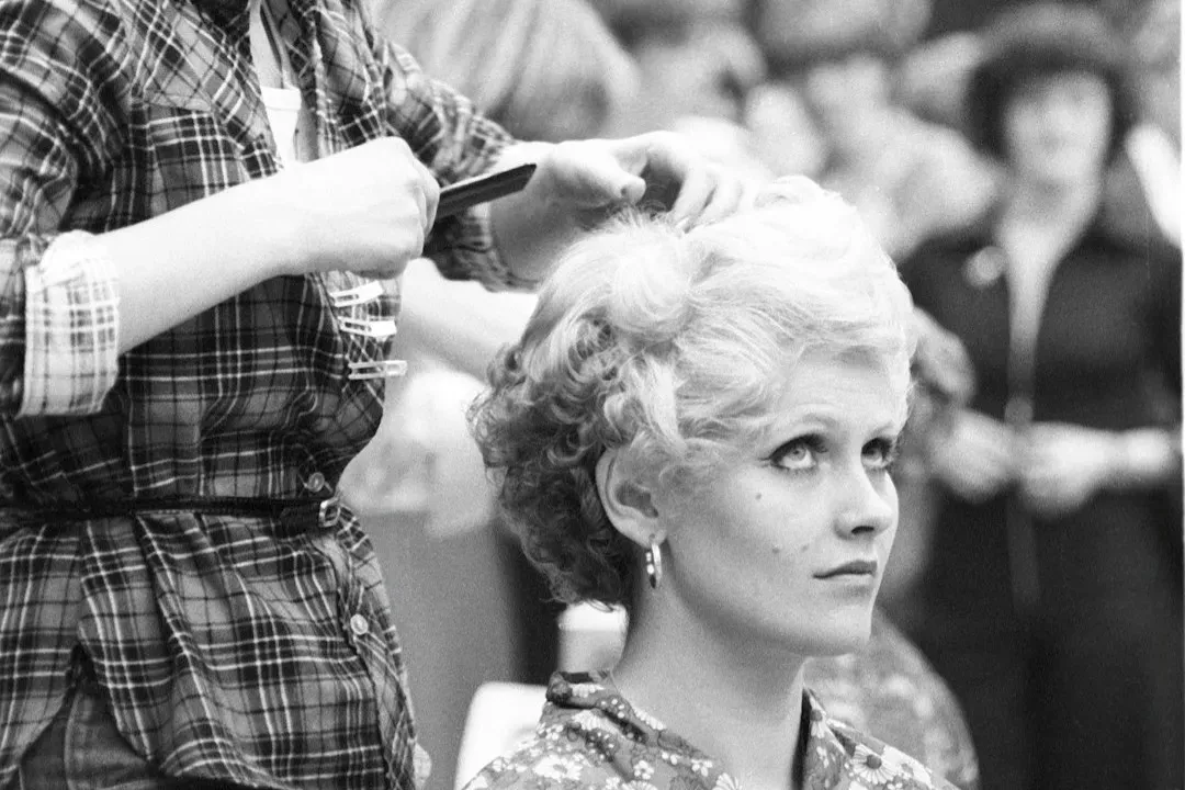 2. Hairstyles That Never Left Their Decade (Image Credits: Unsplash)