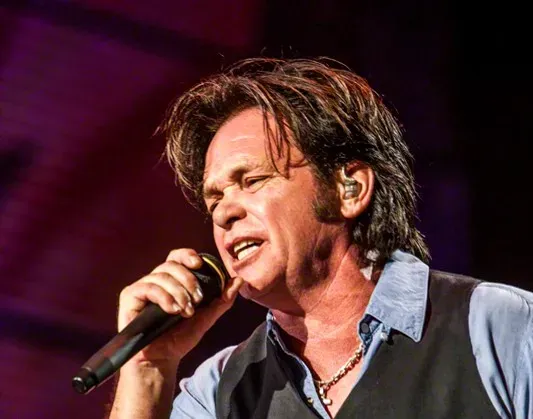 John Mellencamp and "R.O.C.K. in the U.S.A." (Image Credits: Wikimedia)