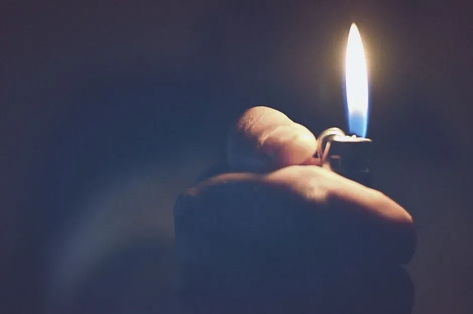 5. A Sea of Lighters Swaying During the Power Ballad (Image Credits: Pexels)