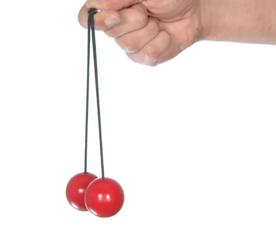 3. Clackers - Two Balls, One String, and a Shattering Problem (Image Credits: Wikimedia)