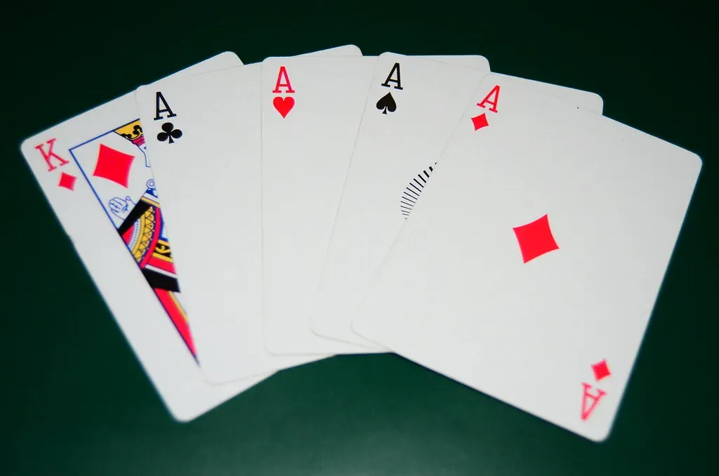 4. Keep Your Hands Off the Cards in Shoe Games (pokerphotos, Flickr, CC BY 2.0)