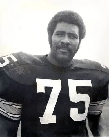 2. Coca-Cola "Mean Joe Greene" - When Sports and Emotion Collided (ebay.com, front of photo, back of photo, Public domain)